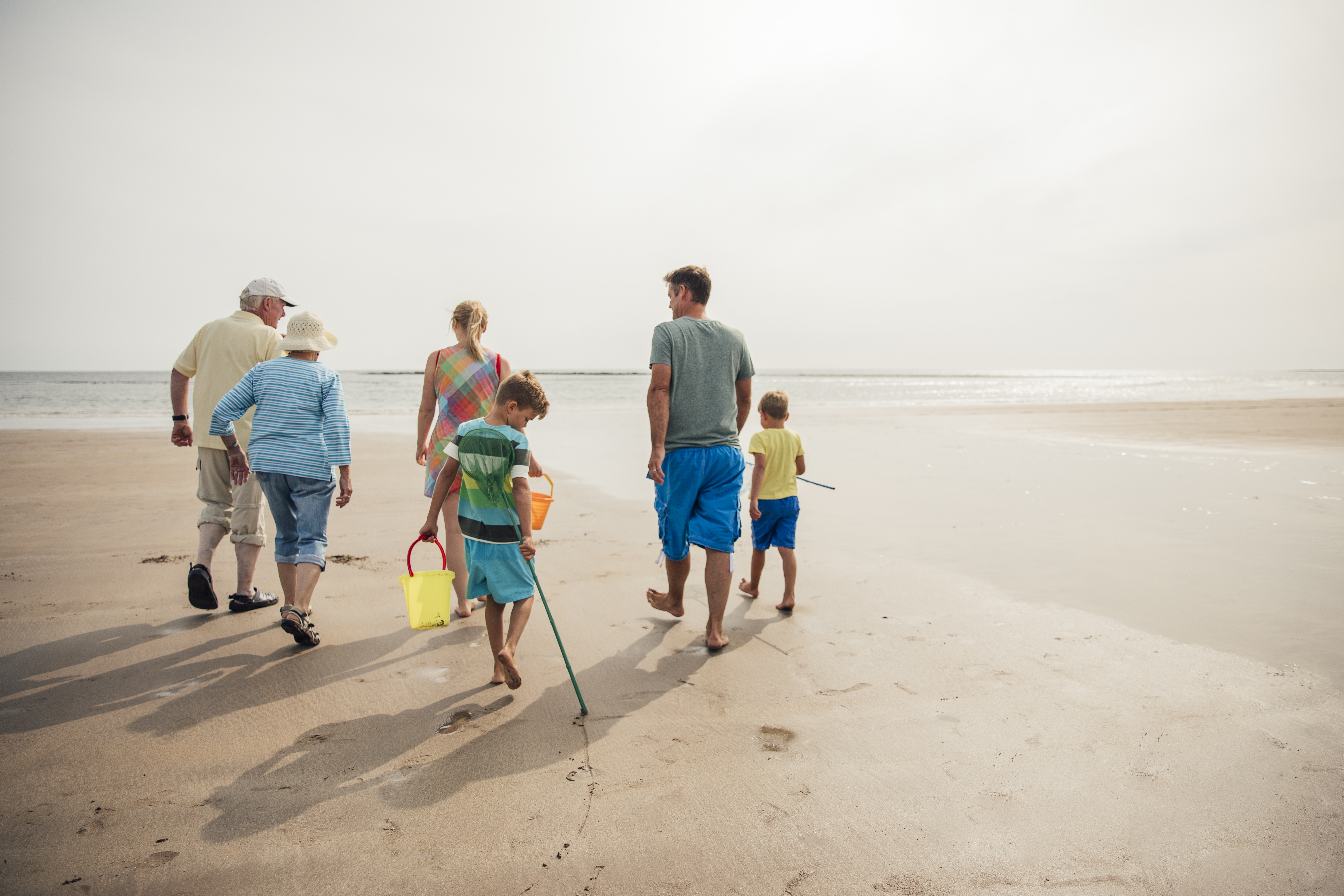 Family Walking on the Beach